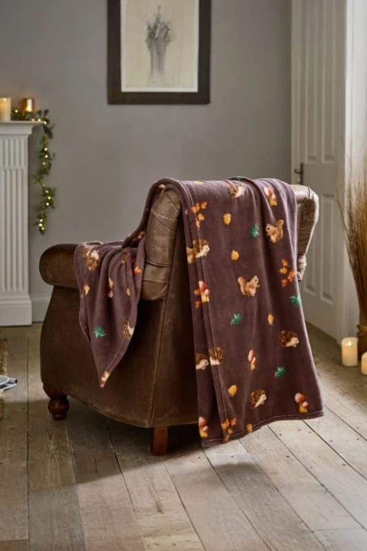 Image of Deyongs Deyongs Hogging It Throw Wine - Hedgehog & Woodland Animal Fleece Blanket 140x180cm Size: 140cm x 180cm Wine 140cm x 180cm Unisex 5054990139