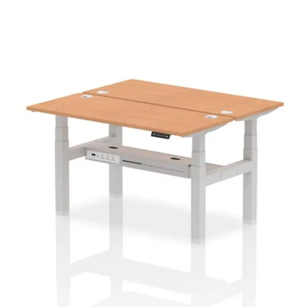 Image of Air Air Back-to-Back 1400 x 600mm Height Adjustable 2 Person Bench Desk Oak Top with Cable Ports Silver Frame HASCP2P14600OAKS