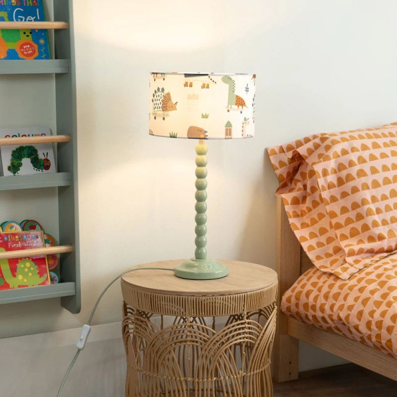Image of ValueLights Bobbins Sage Green Table Lamp with Cartoon Dino Drum Lamp Shade Multi