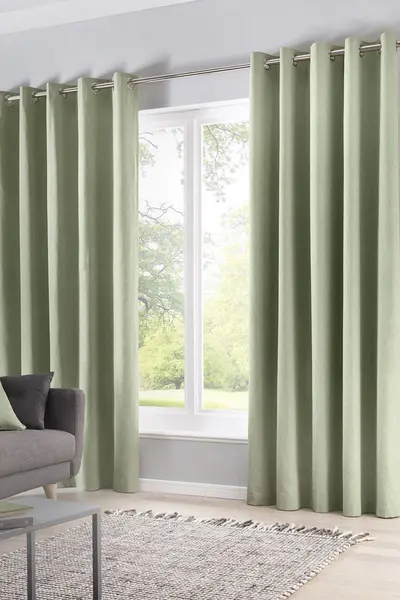 Image of Fusion 'Sorbonne' 100% Cotton Light Filtering Plain Dyed Eyelet Curtains Green