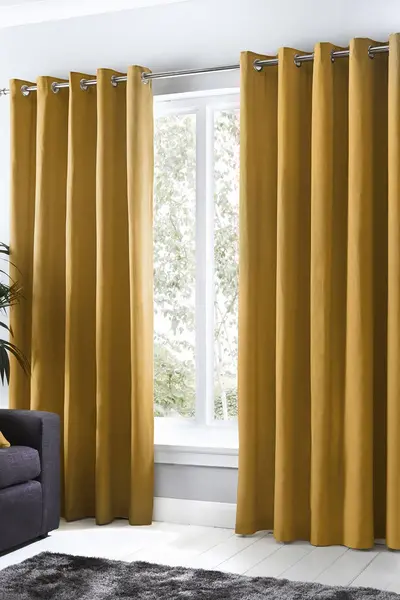 Image of Fusion 'Sorbonne' 100% Cotton Light Filtering Plain Dyed Eyelet Curtains Mustard