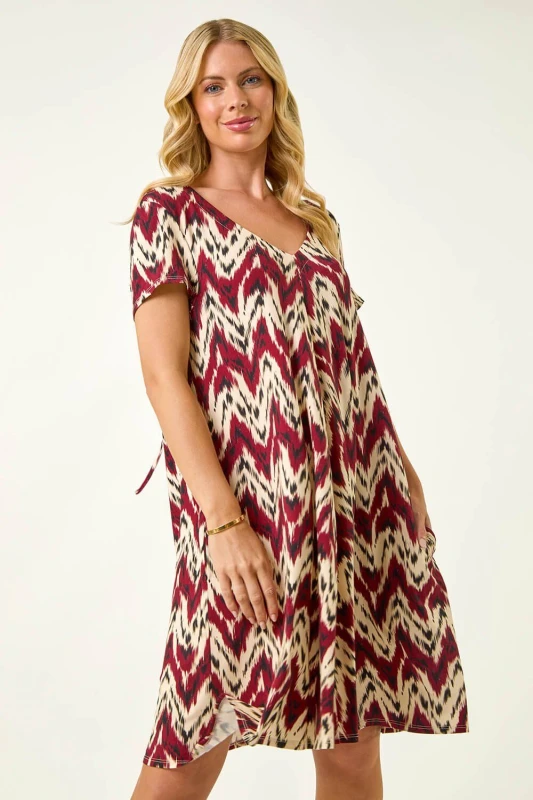 Image of Roman Womens Petite Abstract Print Swing Stretch Dress in Orange Size: 14 Orange Female 14