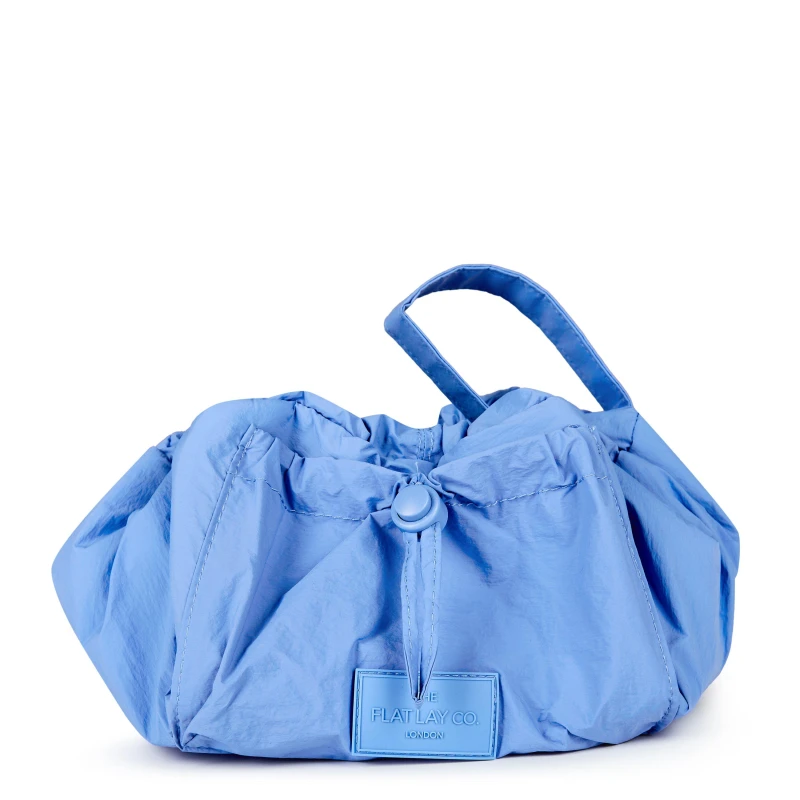 Image of The Flat Lay Co The Flat Lay Co. Drawstring Makeup Bag in Blue Parachute Multi unisex