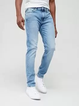 Image of Calvin Klein Jeans Slim Taper Fit Jeans - Light Denim, Light Denim, Size 32, Length Regular, Men