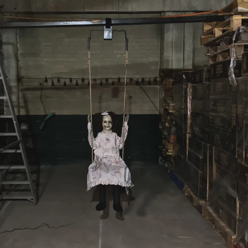 Image of 5.5ft Motion Activated Animated Swinging Decrepit Halloween Doll with LEDs