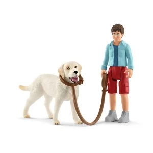 Image of SCHLEICH Farm World Walking with Labrador Retriever Toy Figure Set