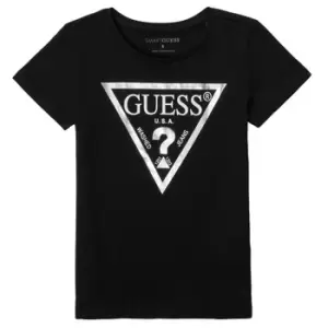 Image of Guess HABILLA girls's Childrens T shirt in Black. Sizes available:8 ans,10 ans,12 ans,14 ans,16 ans