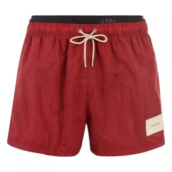 Image of Calvin Klein Waistband Patch Swim Shorts - Rhubarb