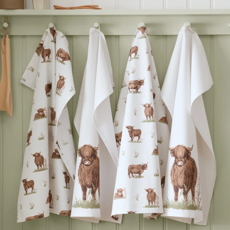 Image of Catherine Lansfield Angus Highland Cow Kitchen Tea Towel Pack of 4 Natural unisex 50x70cm
