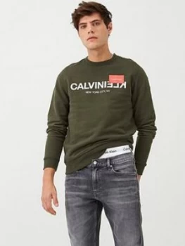 Image of Calvin Klein Reverse Text Logo Sweatshirt - Dark Olive, Dark Olive, Size 2XL, Men