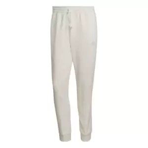 Image of adidas Essentials Fleece Tapered Cuff 3-Stripes Joggers M - White
