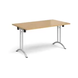 Image of Rectangular folding leg table with silver legs and curved foot rails 1400mm x 800mm - oak