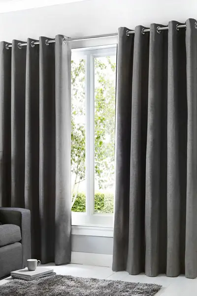 Image of Fusion 'Sorbonne' 100% Cotton Light Filtering Plain Dyed Eyelet Curtains Charcoal