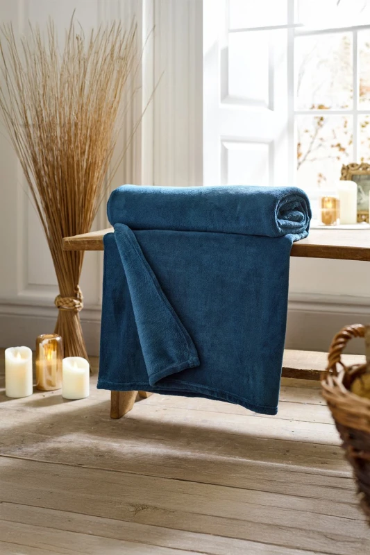 Image of Deyongs Deyongs Snuggle Touch Super Soft Solid Colour Fleece Throw in Navy Size: 140cm x 180cm Navy 140cm x 180cm Unisex 5054990142740