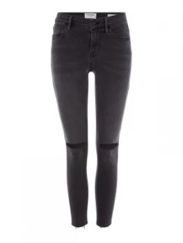 Image of Frame Mid Rise Black Ripped Knee Skinny Jeans Black