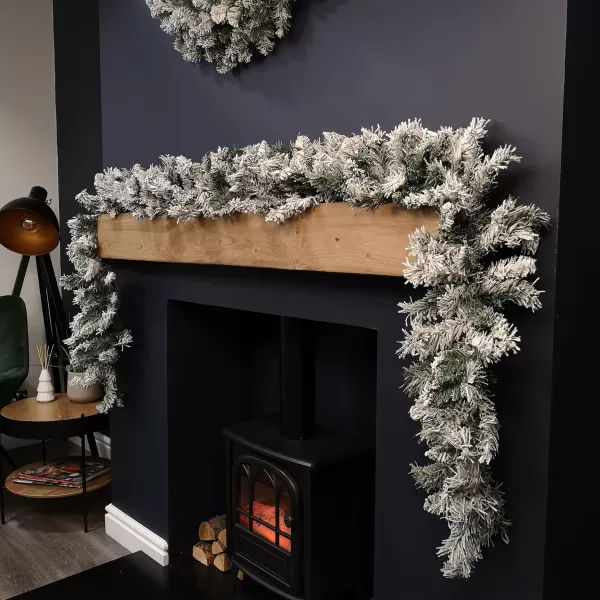 Image of 2.7m Green Snow Flocked Christmas Garland with 190 Tips