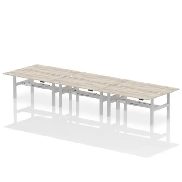 Image of Air Air Back-to-Back 1800 x 800mm Height Adjustable 6 Person Bench Desk Grey Oak Top with Cable Ports Silver Frame HASCP6P18800GRYS