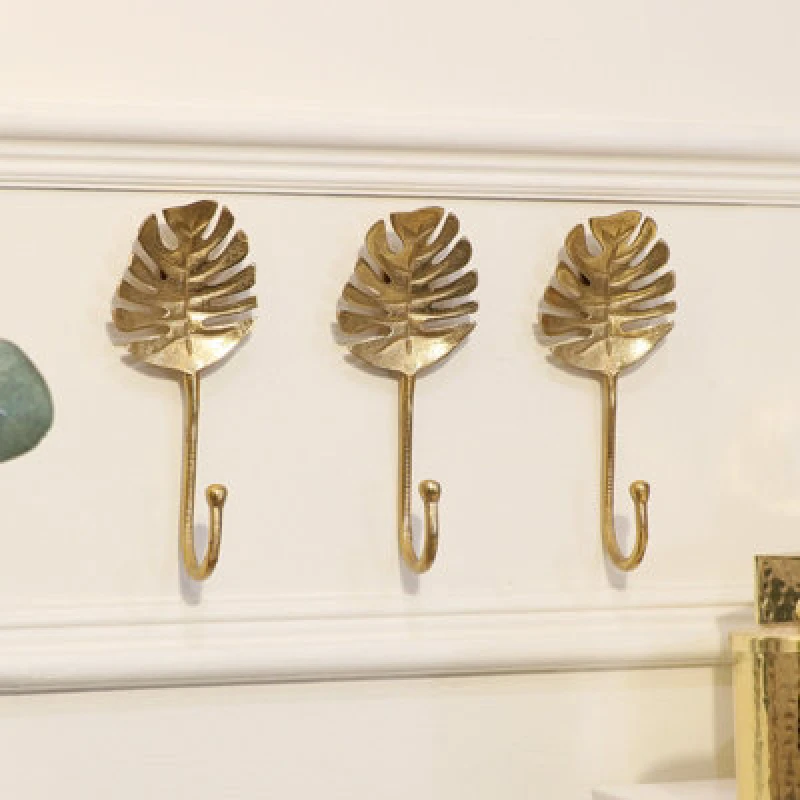 Image of Melody Maison Set Of 3 Gold Monstera Leaf Wall Hooks Metallic Gold