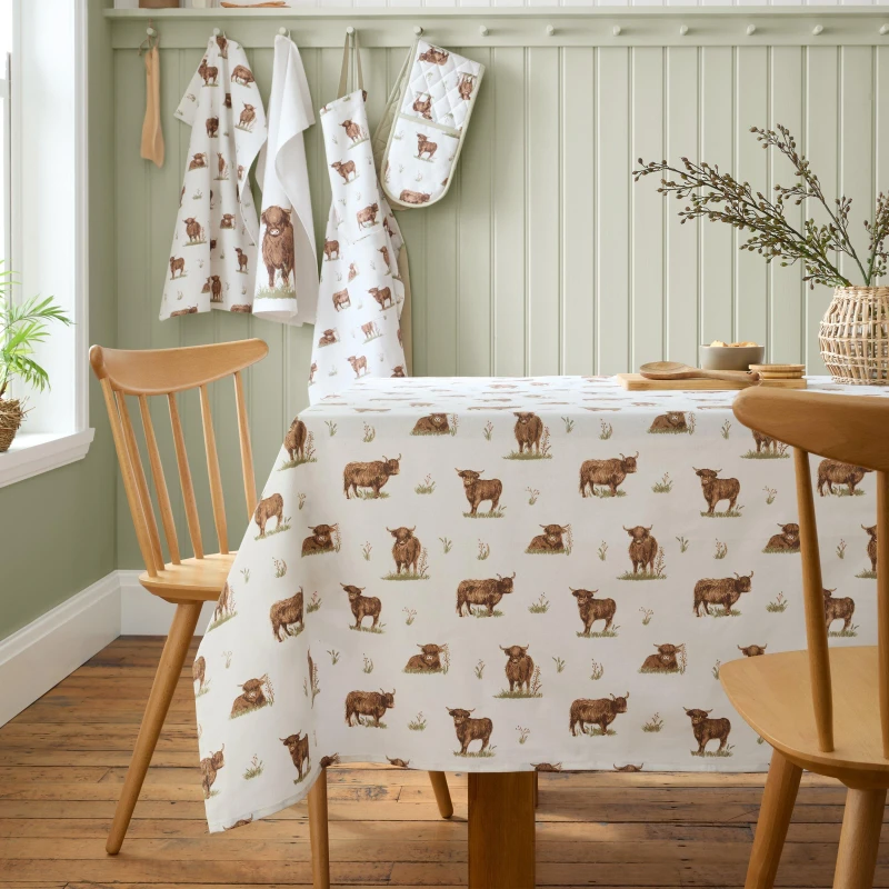 Image of Catherine Lansfield Catherine Lansfield 'Angus Highland Cow' Cotton 137x229cm Table Cloth in Natural Natural One Size Unisex 5057681188317