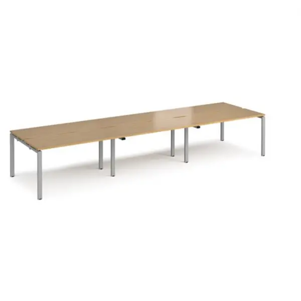 Image of Adapt Bench Desk 6 Person Rectangular Desks 4200mm With Sliding Tops Oak Tops With Black Frames 1200mm Depth Adapt STE4212-S-O Oak STE4212-S-O