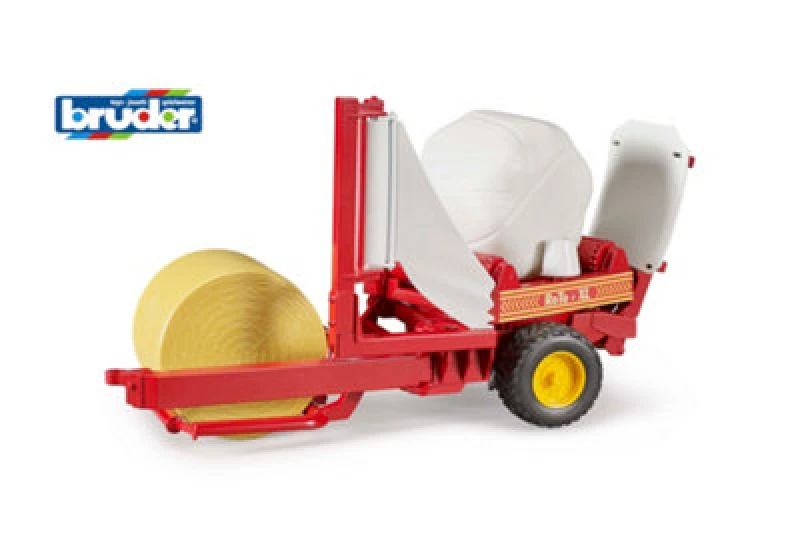 Image of Bruder Bale Wrapper With Ochre And White Round Bales Detailed Vehicle & Playset Model