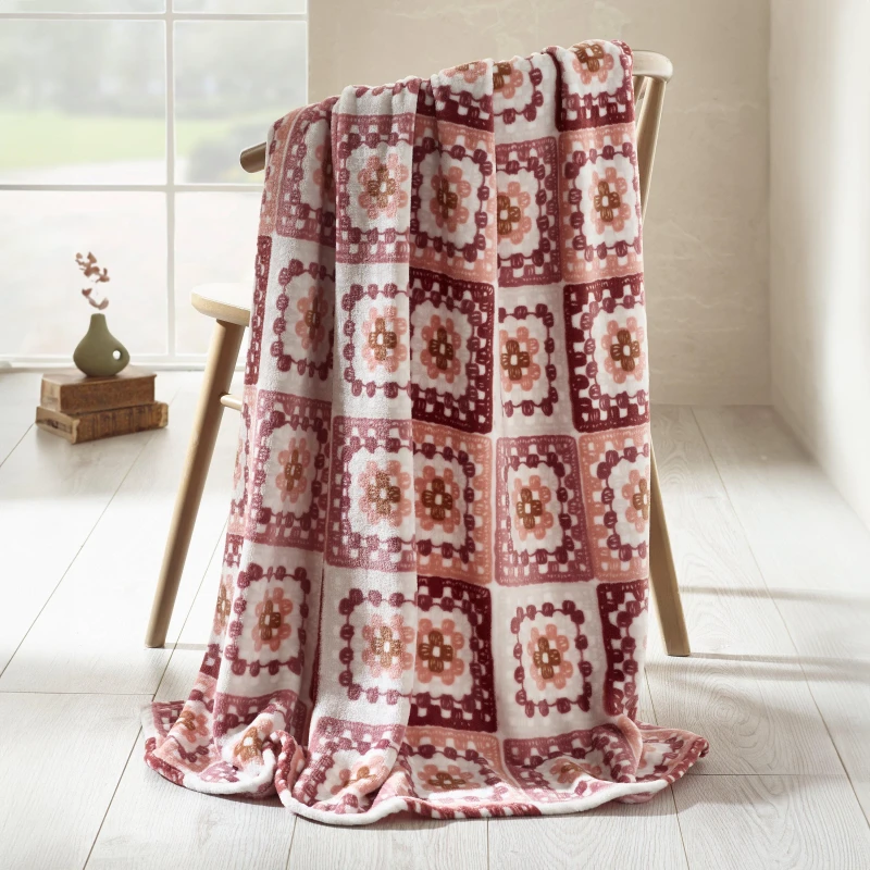 Image of Catherine Lansfield Catherine Lansfield 'Crochet Print' Cosy Blanket Throw in Pink Size: 130cm x 170cm Pink 130cm x 170cm Unisex 5057681185460