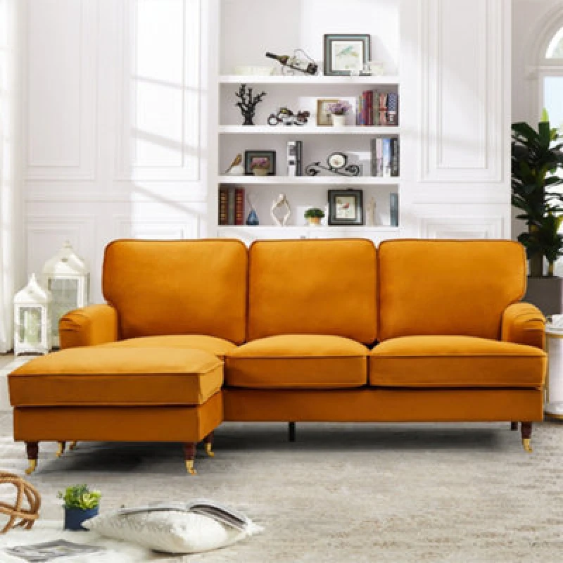 Image of Woodbury 218Cm Reversible Orange Velvet Fabric Corner Sofa Walnut Colour Legs With Brass Coloured Wheel