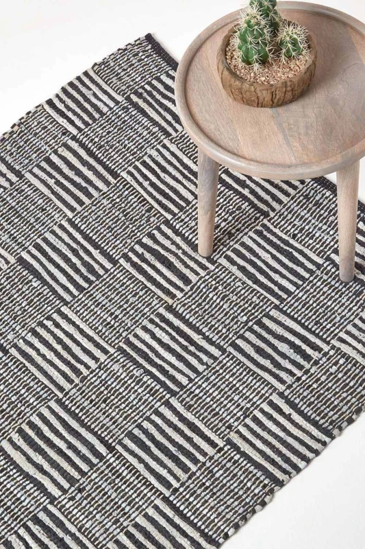 Image of Homescapes Black & White Real Leather Handwoven Striped Block Check Rug, 150 X 240 Cm