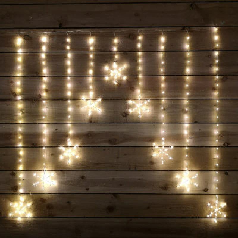 Image of Samuel Alexander 1.2m x 1.2m Premier Christmas Static Snowflake LED Silver Pin Wire V Curtain Lights in Warm White Beige