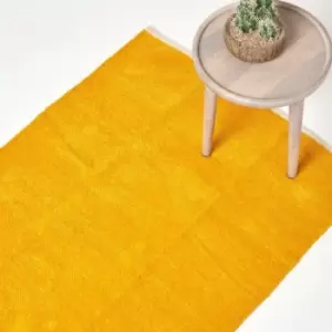 Image of Mustard 100% Cotton Plain Chenille Rug with Natural Trim, 60 x 100cm - Yellow - Homescapes