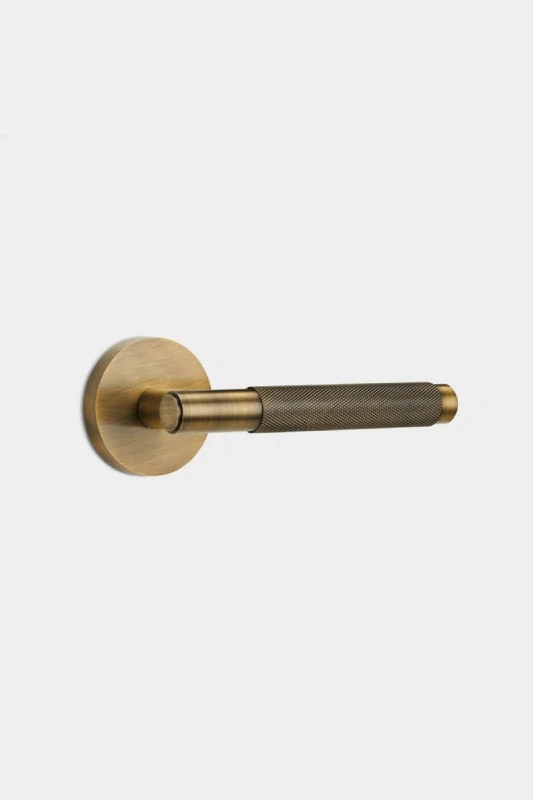 Image of PUSHKA HOME Solid Brass Knurled Door Lever Handle - Antique Gold Gold Unisex
