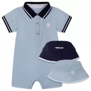Image of Timberland Newborn Hat And Polo Romper Set In Blue - Size 6 Months