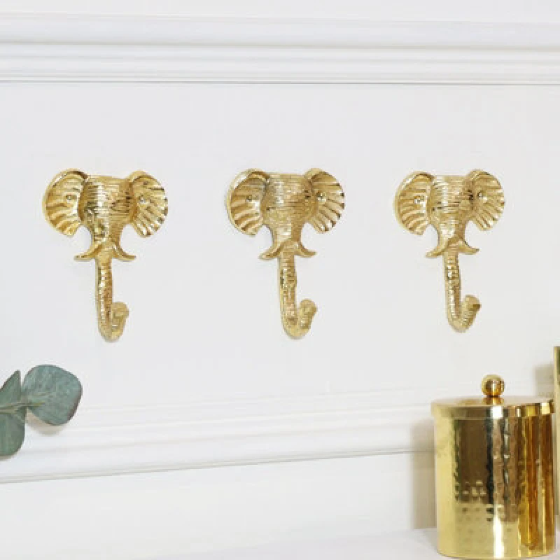 Image of Melody Maison Set Of 3 Gold Elephants Head Wall Hooks Metallic Gold unisex