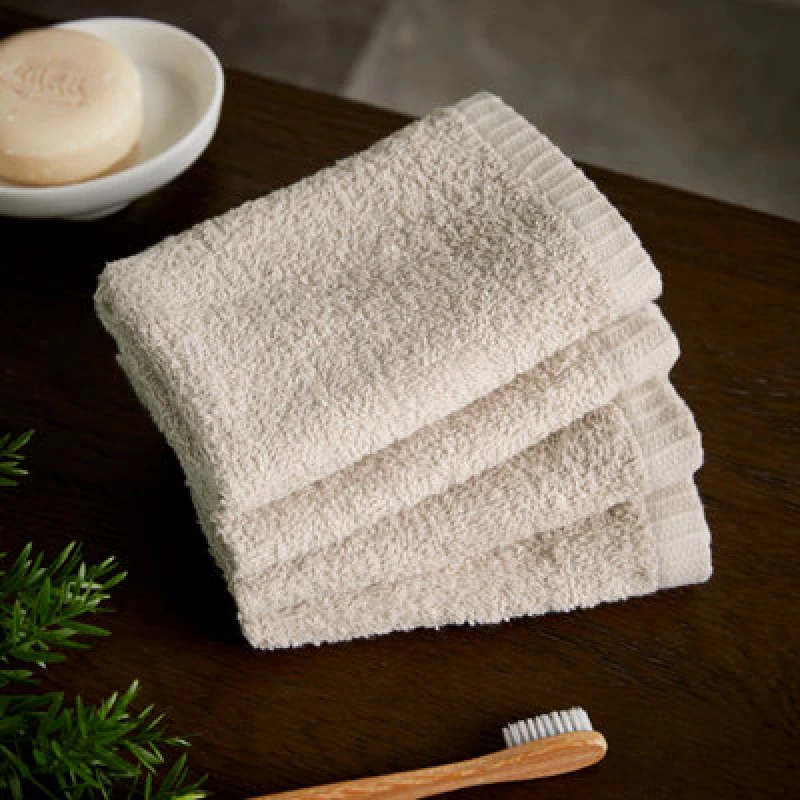 Image of Catherine Lansfield Catherine Lansfield 'Quick Dry' Face Cloth 4 Pack in Natural Size: Face Towel Natural Face Towel Unisex 5057681106175