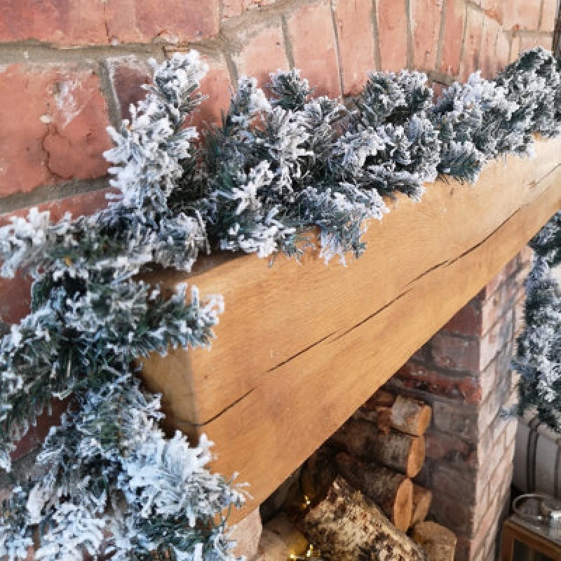 Image of Samuel Alexander 9ft (2.7m) Premier Christmas Snow Flocked Woodcote Fir Garland Green