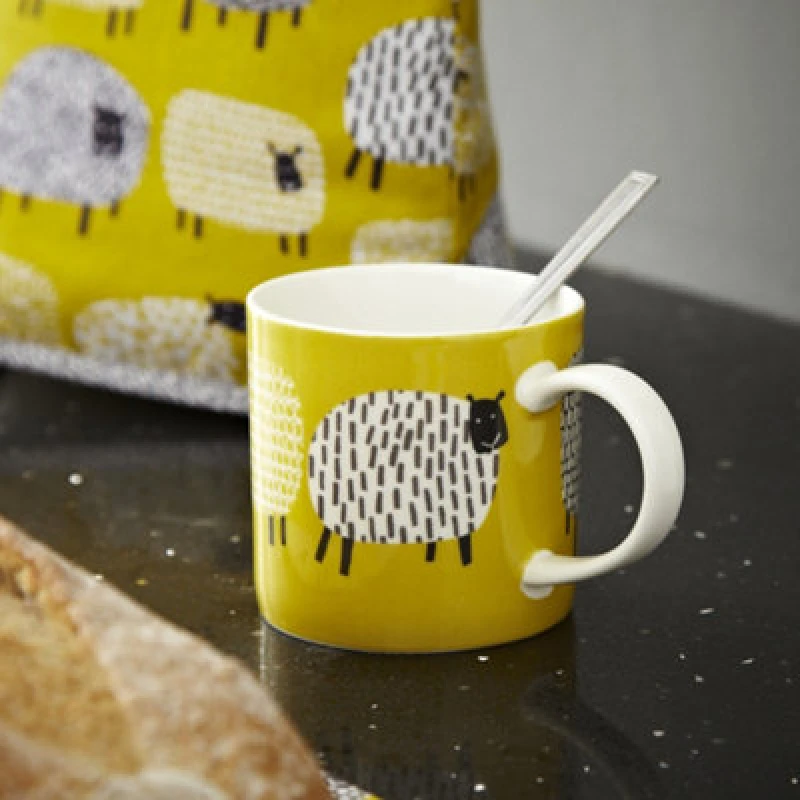 Image of Ulster Weavers 'Dotty Sheep' Animal Print New Bone China Mug Yellow unisex