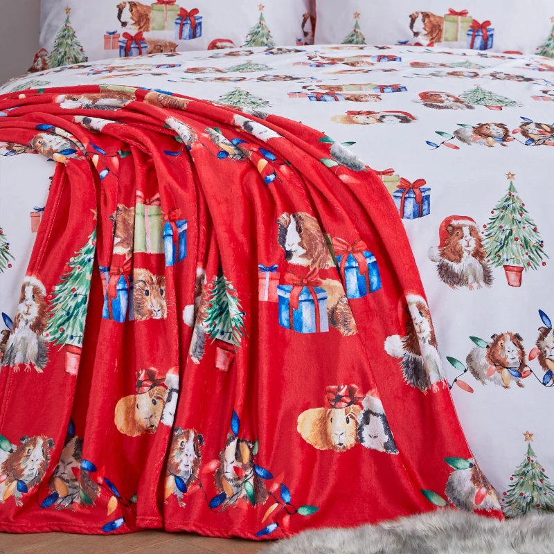 Image of Catherine Lansfield Christmas Guinea Pigs Fleece Throw 130cm x 170cm Red