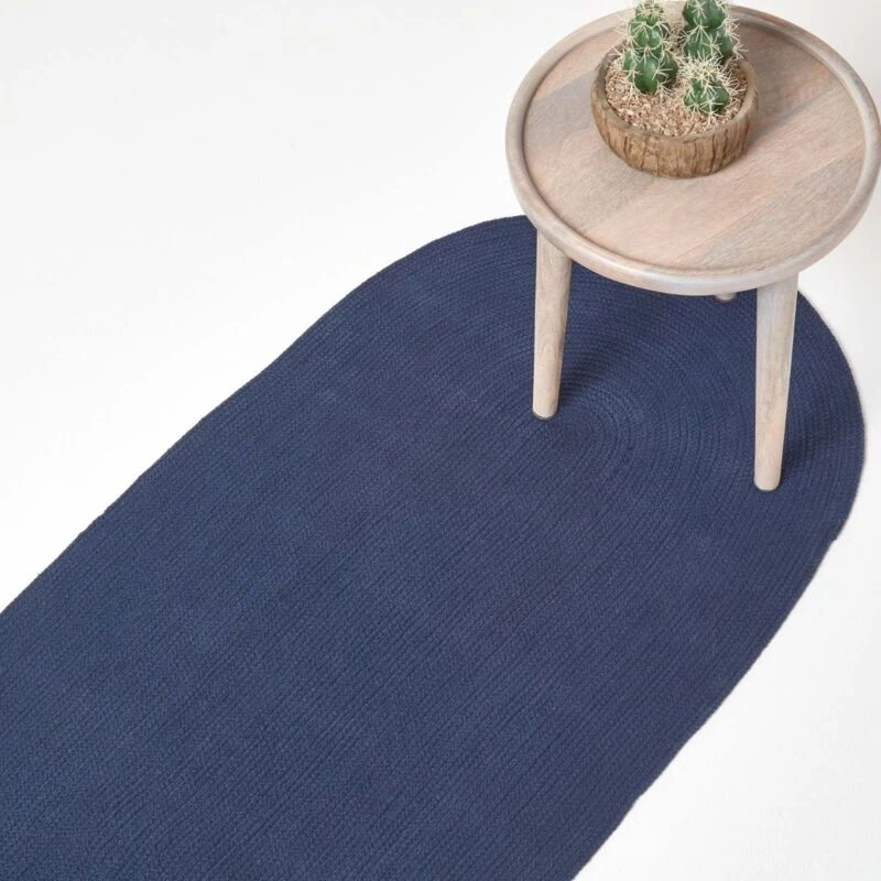 Image of Homescapes Handmade Woven Braided Oval Hallway Rug, 66 x 200cm Navy