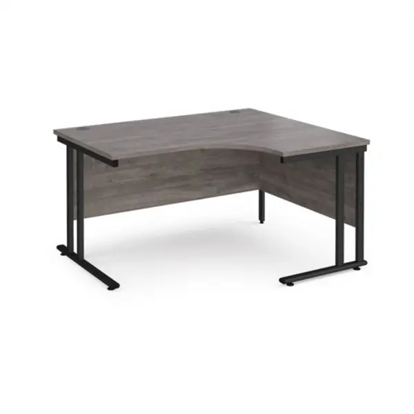 Image of Maestro 25 right hand ergonomic desk 1400mm wide - Black cantilever leg frame, grey oak top