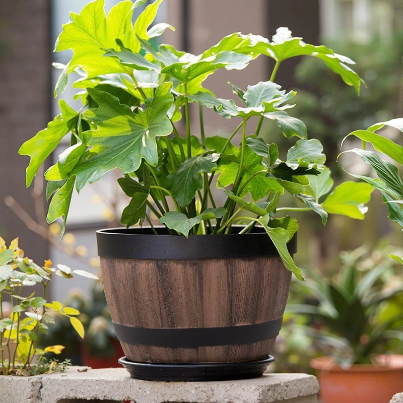 Image of LIFE IDEAS Wooden Barrel Plastic Plant Pots Set of 4 Brown unisex One size