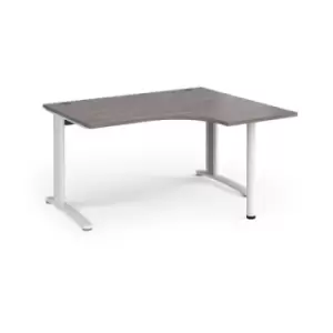 Image of TR10 right hand ergonomic desk 1400mm - white frame and grey oak top