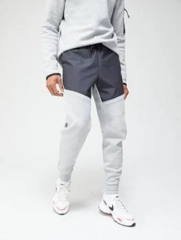 Image of Nike Tech Fleece/Nylon Mix Pants - Dark Grey, Size L, Men