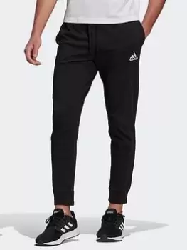 Image of adidas Essentials Single Jersey Tapered Cuff Joggers, Blue Size XL Men