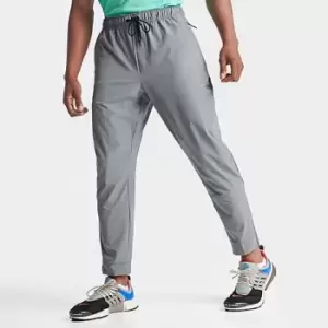 Image of Mens Nike Dri-FIT Unlimited Tapered Leg Versatile Training Pants