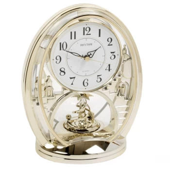 Image of Rhythm Gold Oval Mantel Clock - Shooting Star Pendulum