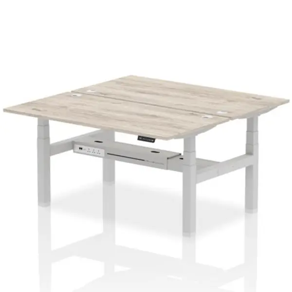 Image of Air Air Back-to-Back 1600 x 800mm Height Adjustable 2 Person Bench Desk Grey Oak Top with Cable Ports Silver Frame HASCP2P16800GRYS