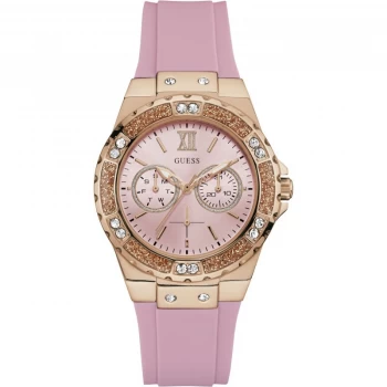 Image of GUESS Ladies rose gold watch with pink dial.