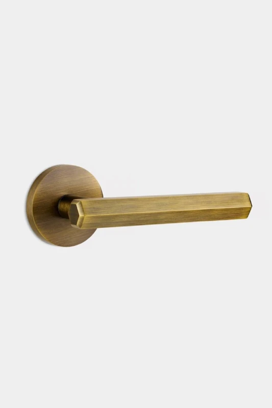 Image of PUSHKA HOME Solid Brass Hexagonal Door Lever Handle - Antique Gold Gold Unisex
