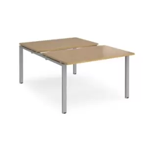 Image of Bench Desk 2 Person Starter Rectangular Desks 1200mm With Sliding Tops Oak Tops With Silver Frames 1600mm Depth Adapt