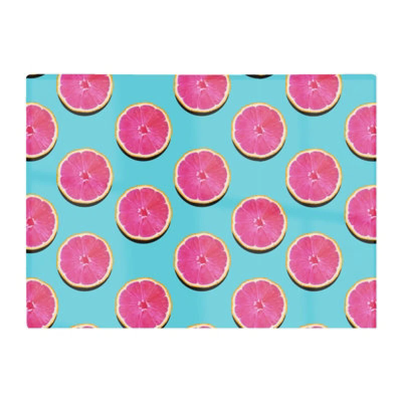 Image of Warren Reed Designer Fruity Pattern Of Pink Grapefruit Glass Chopping Board